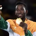 qnet-signe-un-accord-de-partenariat-avec-le-champion-olympique-de-taekwondo-cheick-cisse