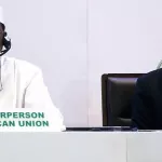 30eme-sommet-de-l-ua-paul-kagame-coupe-le-micro-a-idriss-deby