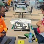 scrabble-mamadou-sanoko-domine-le-francais-gauthier-houillon-et-offre-a-la-cote-d-ivoire-un-3e-titre-mondial