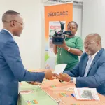 dedicace-de-livre-du-prof-lacina-coulibaly-je-cede-mes-droits-d-auteur-au-rhdp