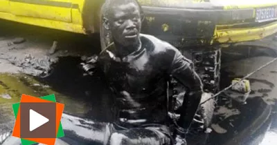un-voleur-de-pieces-autos-ligote-et-enduit-d-huile-de-moteur-a-koumassi-remblais