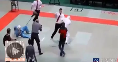 un-arbitre-de-karate-met-ko-deux-combattants